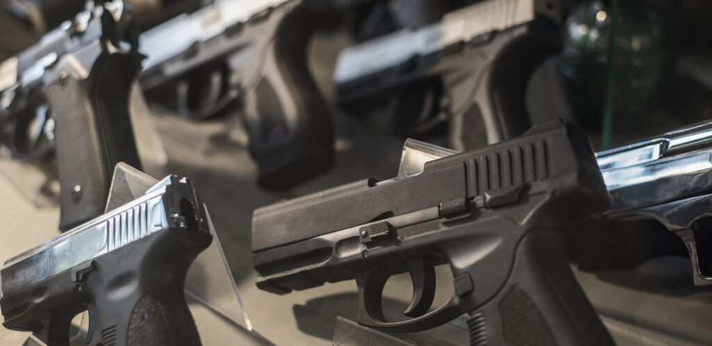 A display shelf of handguns